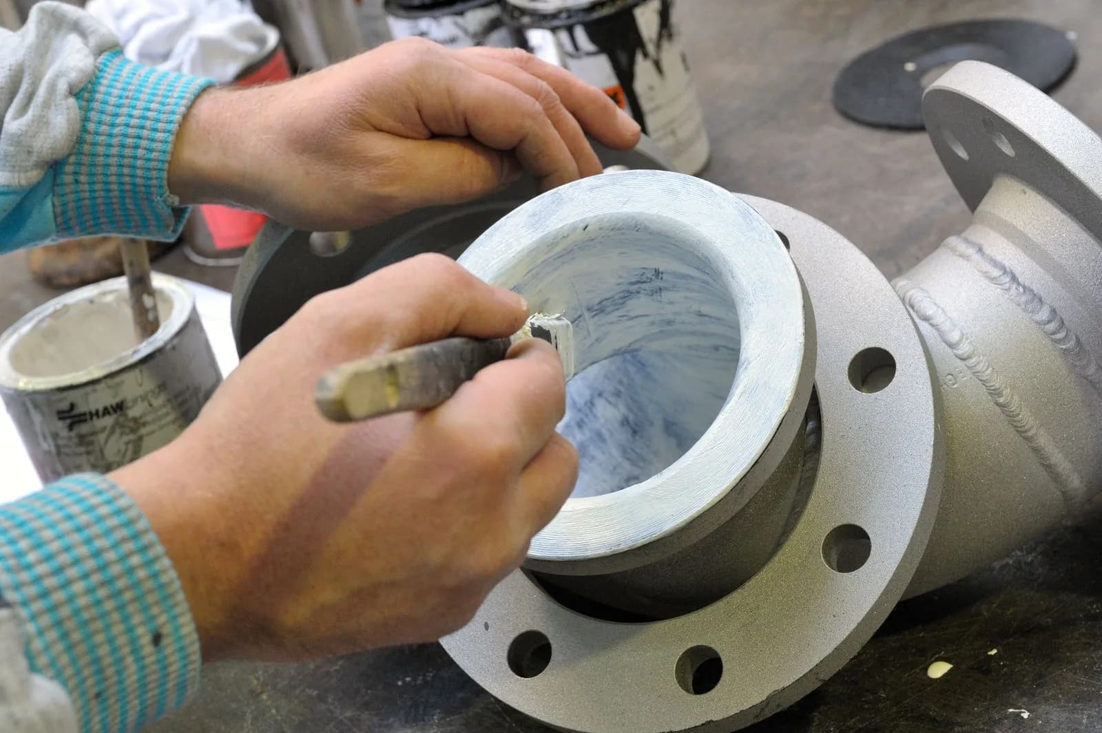 Lining a Flanged Pipe Fitting